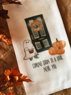 Coming Soon To A Door Near You Tea Towel